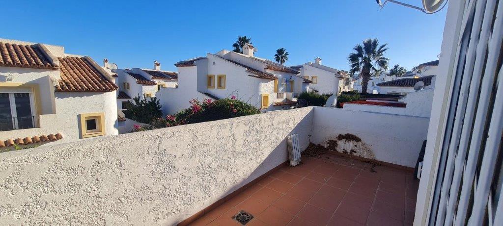 Halfvrijstaande woning met gemeenschappelijk zwembad dichtbij alle voorzieningen in Calpe (Noordelijke Costa Blanca)