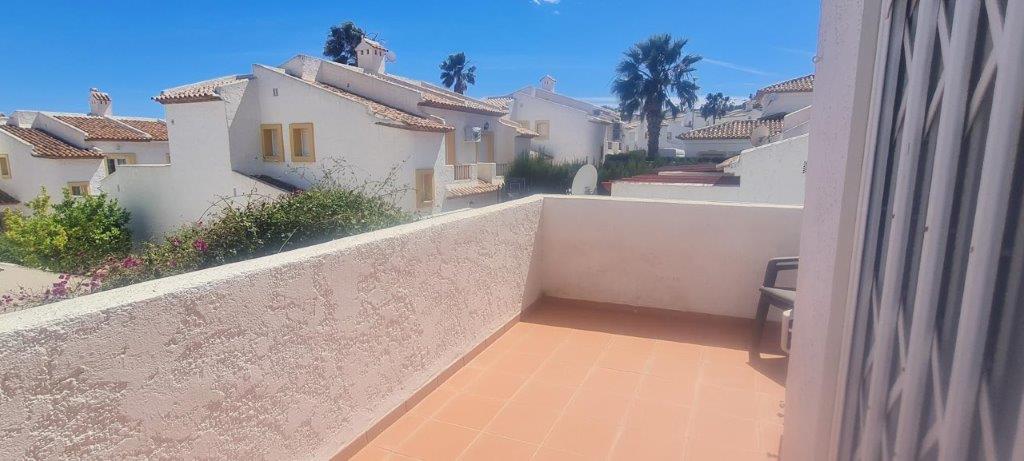 Halfvrijstaande woning met gemeenschappelijk zwembad dichtbij alle voorzieningen in Calpe (Noordelijke Costa Blanca)